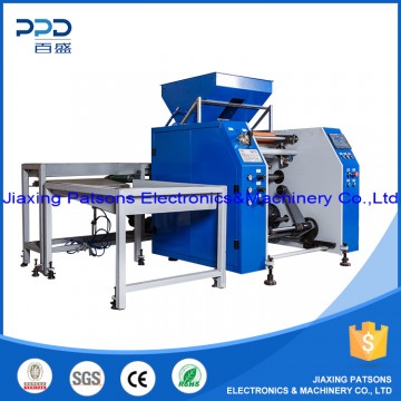 Automatic rewinding machine for PVC cling film catering roll